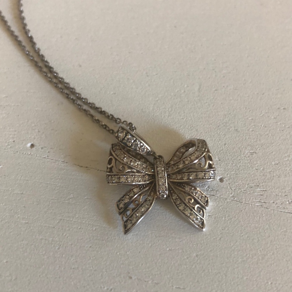 Is it a bow or a butterfly? Delicate silver mix